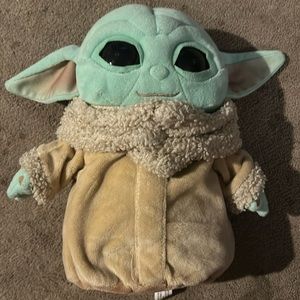 Grogu plush toy bought at Disneyworld StarWars ride